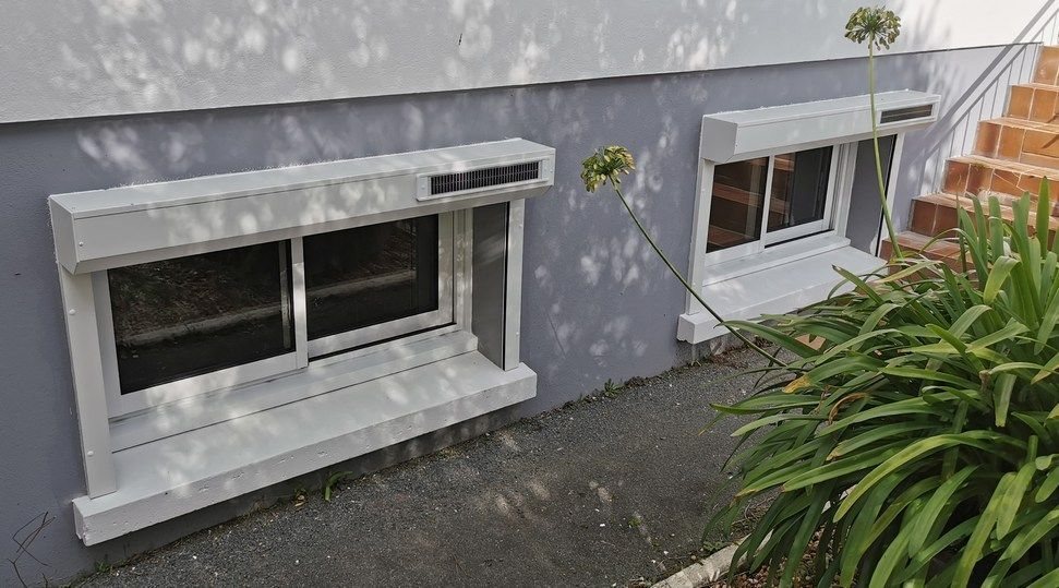 Fenêtres coulissantes avec volets intégrés